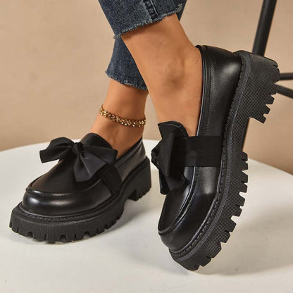Stylish, cute platform loafers with a bow