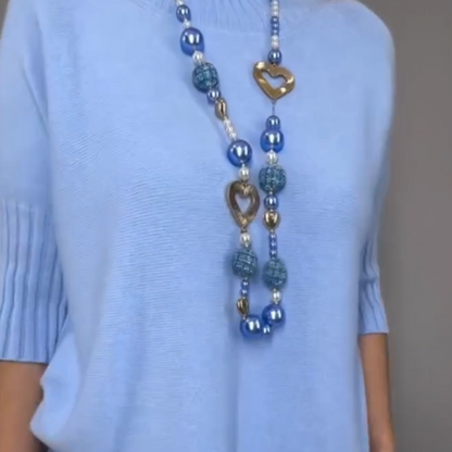 Elegant 2-piece set consisting of a knitted sweater and midi skirt